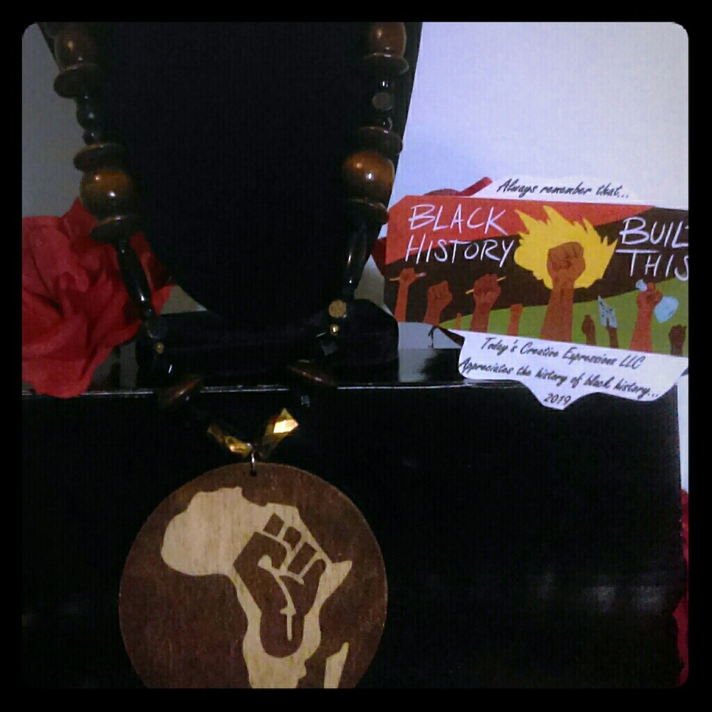 The Brown Wood Fist Necklace